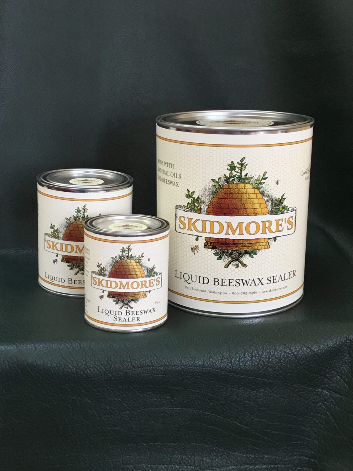Liquid beeswax wood sealer, pint through 5-gallon sizes, by Skidmore's — low-VOC protection for indoor and marine wood