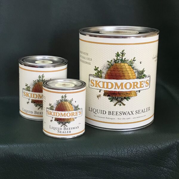 Liquid beeswax wood sealer, pint through 5-gallon sizes, by Skidmore's — low-VOC protection for indoor and marine wood