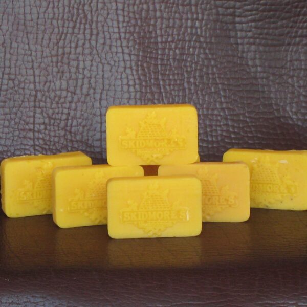 Natural beeswax cakes for leather waterproofing and saddle care by Skidmore's — all-natural, rub-on leather protection