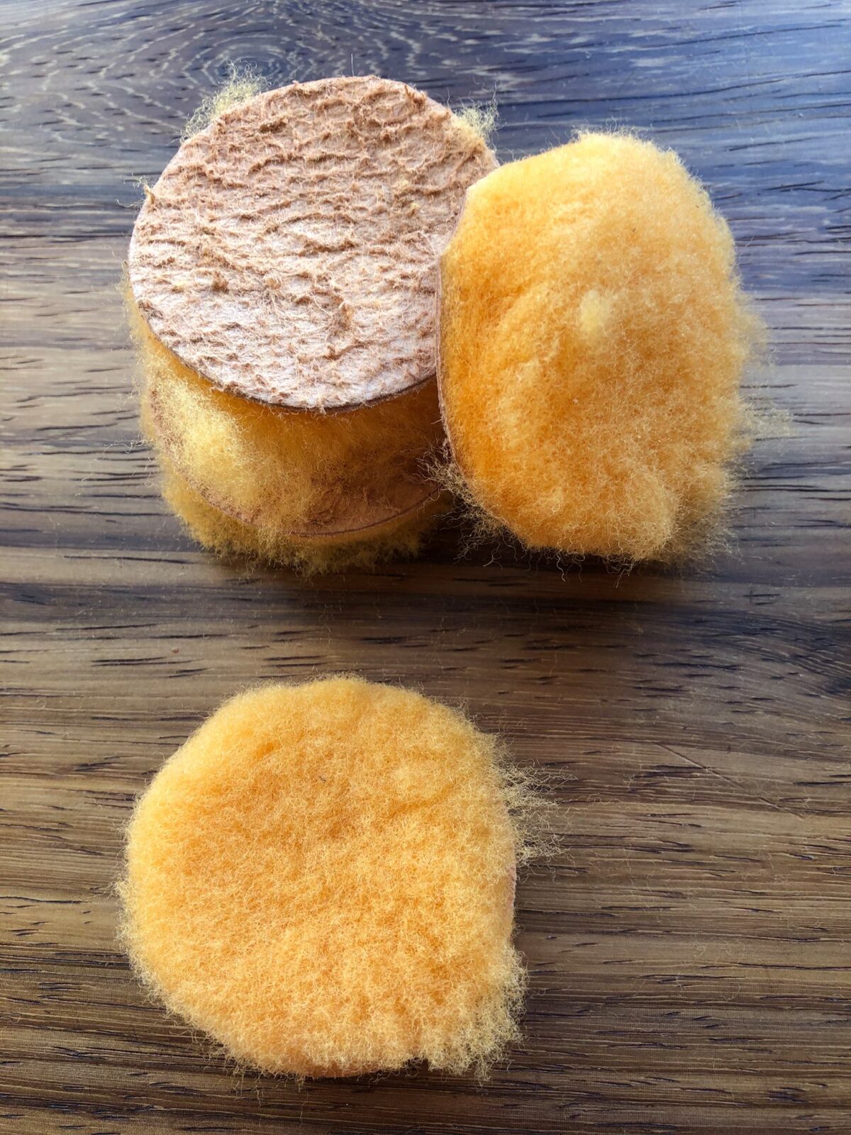 Sheepskin applicator pads for Skidmore's leather cream and wood finish — soft buffing and even coverage